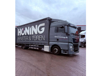 Samochód ciężarowy plandeka MAN TGX 18.440