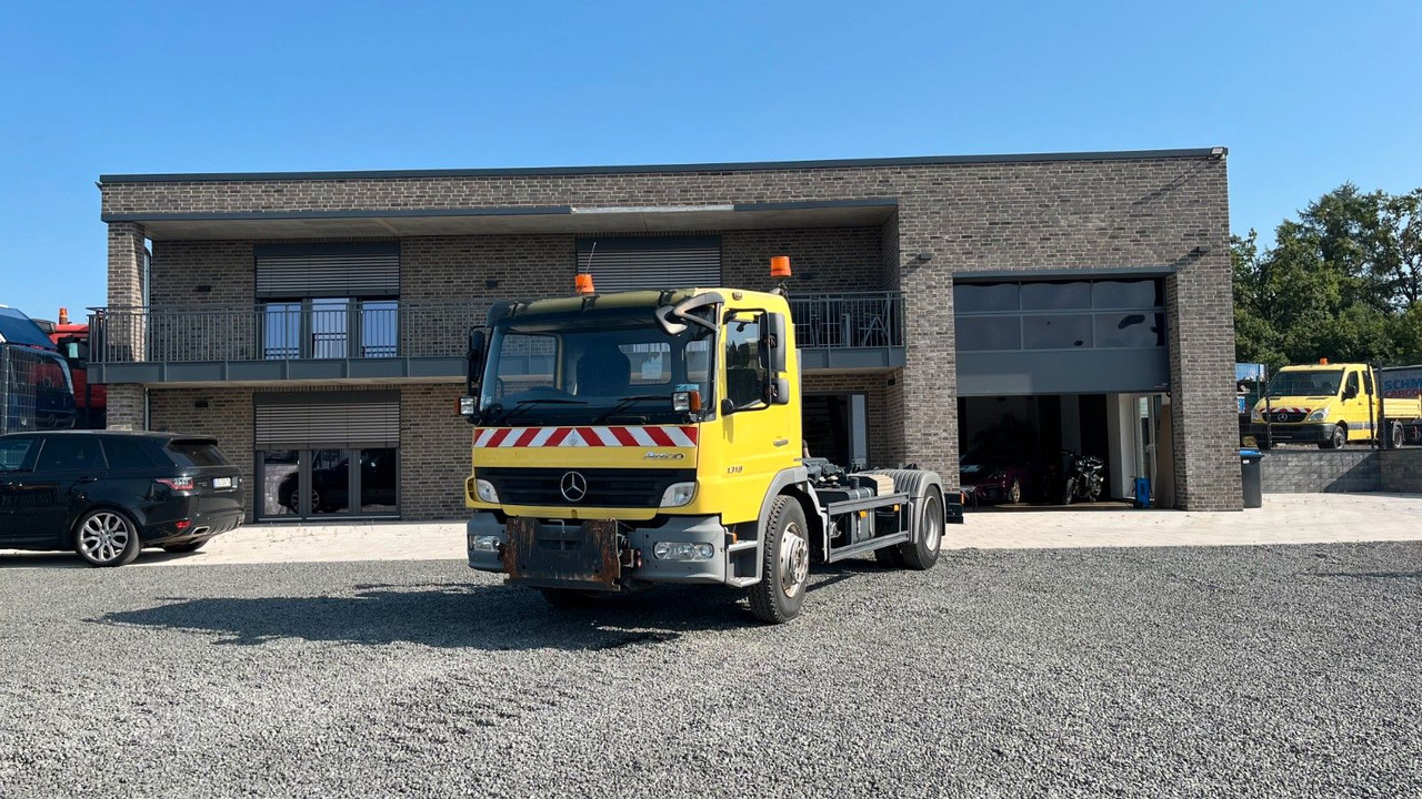 Mercedes-Benz 1318 1218 Abrollkipper Mercedes-Benz 1318 1218 Abrollkipper - Ciężarówka hakowiec: zdjęcie 1 Mercedes-Benz 1318 1218 Abrollkipper Mercedes-Benz 1318 1218 Abrollkipper - Ciężarówka hakowiec: zdjęcie 1