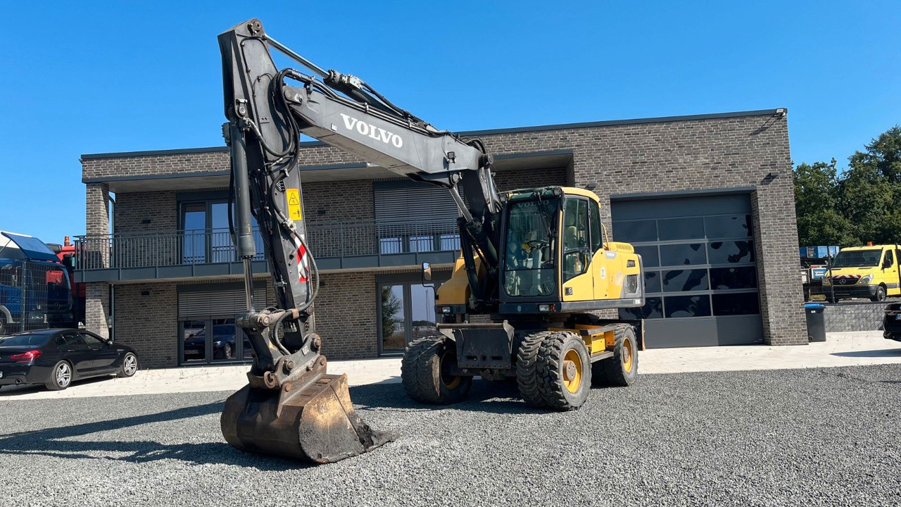 Volvo EW180D 20500 Kg Verstellausleger OilQuick - Koparka kołowa: zdjęcie 1 Volvo EW180D 20500 Kg Verstellausleger OilQuick - Koparka kołowa: zdjęcie 1