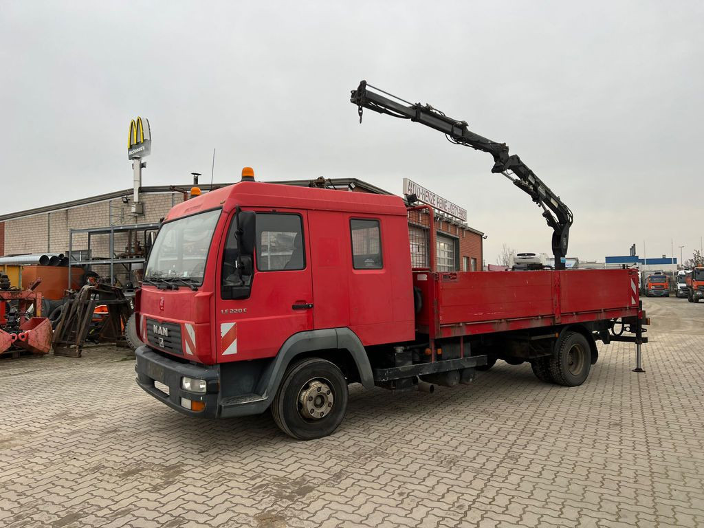 MAN LE 12.225 LC Pritsche Heckkran 6 Zylinder Doka Topzust - Samochód ciężarowy skrzyniowy/ Platforma, Samochod ciężarowy z HDS: zdjęcie 1 MAN LE 12.225 LC Pritsche Heckkran 6 Zylinder Doka Topzust - Samochód ciężarowy skrzyniowy/ Platforma, Samochod ciężarowy z HDS: zdjęcie 1