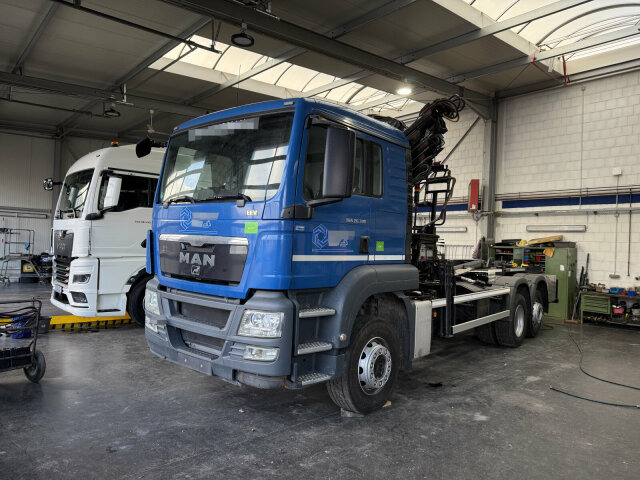MAN TGS 26.320 6x2 Abrollkipper + Kran HIAB 166 E-5 - Ciężarówka hakowiec, Samochod ciężarowy z HDS: zdjęcie 1 MAN TGS 26.320 6x2 Abrollkipper + Kran HIAB 166 E-5 - Ciężarówka hakowiec, Samochod ciężarowy z HDS: zdjęcie 1