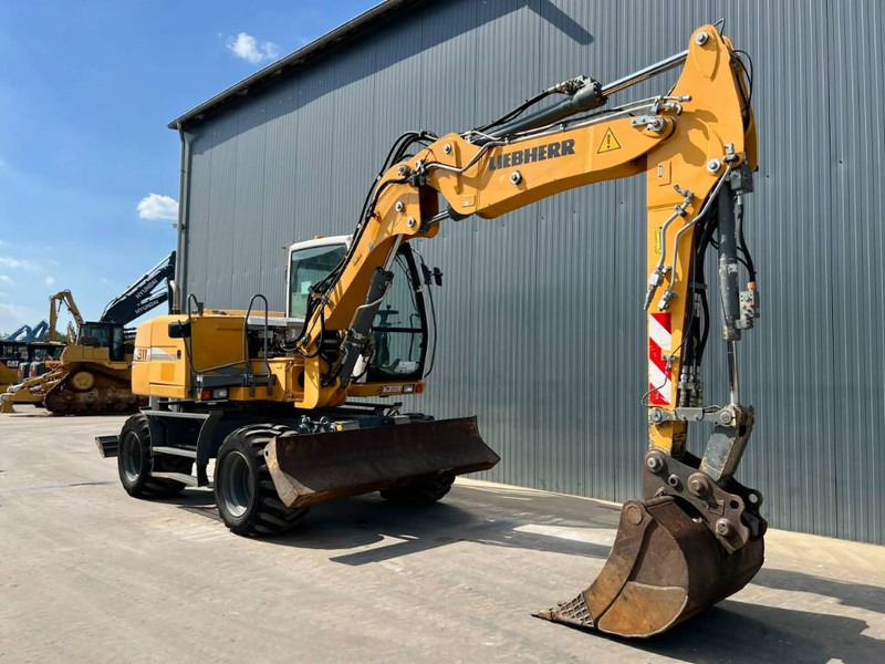 Liebherr A311 Litronic - Koparka kołowa: zdjęcie 3 Liebherr A311 Litronic - Koparka kołowa: zdjęcie 3