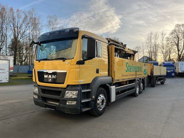 MAN TGS 26.400 Baustoff LKW mit Ladekran Atlas 210.2 MAN TGS 26.400 Baustoff LKW mit Ladekran Atlas 210.2 - Samochód ciężarowy skrzyniowy/ Platforma, Samochod ciężarowy z HDS: zdjęcie 1 MAN TGS 26.400 Baustoff LKW mit Ladekran Atlas 210.2 MAN TGS 26.400 Baustoff LKW mit Ladekran Atlas 210.2 - Samochód ciężarowy skrzyniowy/ Platforma, Samochod ciężarowy z HDS: zdjęcie 1