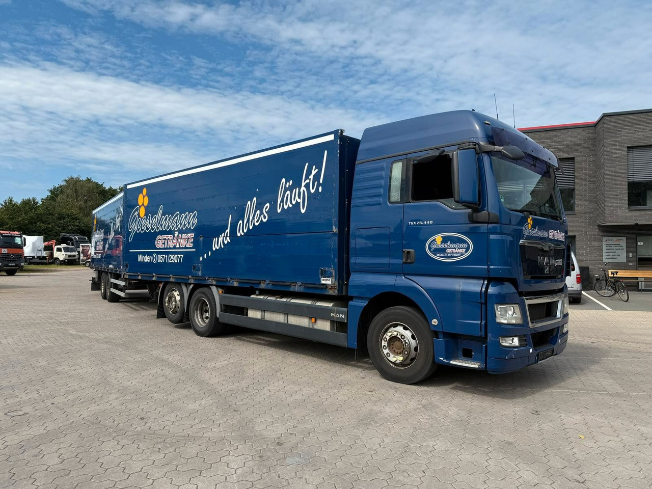 MAN TGA Schwenkwand-Getränkeaufbau incl. Anhänger - Ciężarówka do transportu napojów: zdjęcie 1 MAN TGA Schwenkwand-Getränkeaufbau incl. Anhänger - Ciężarówka do transportu napojów: zdjęcie 1