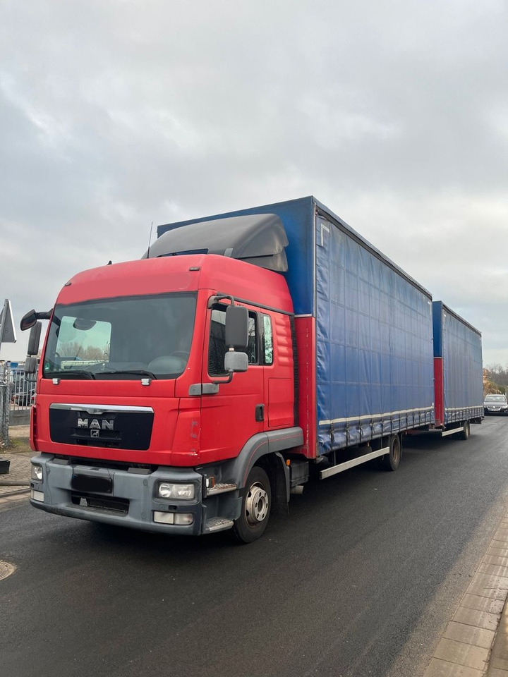 MAN 8.220 4X2 Pritschenwagen - Samochód ciężarowy plandeka: zdjęcie 1 MAN 8.220 4X2 Pritschenwagen - Samochód ciężarowy plandeka: zdjęcie 1