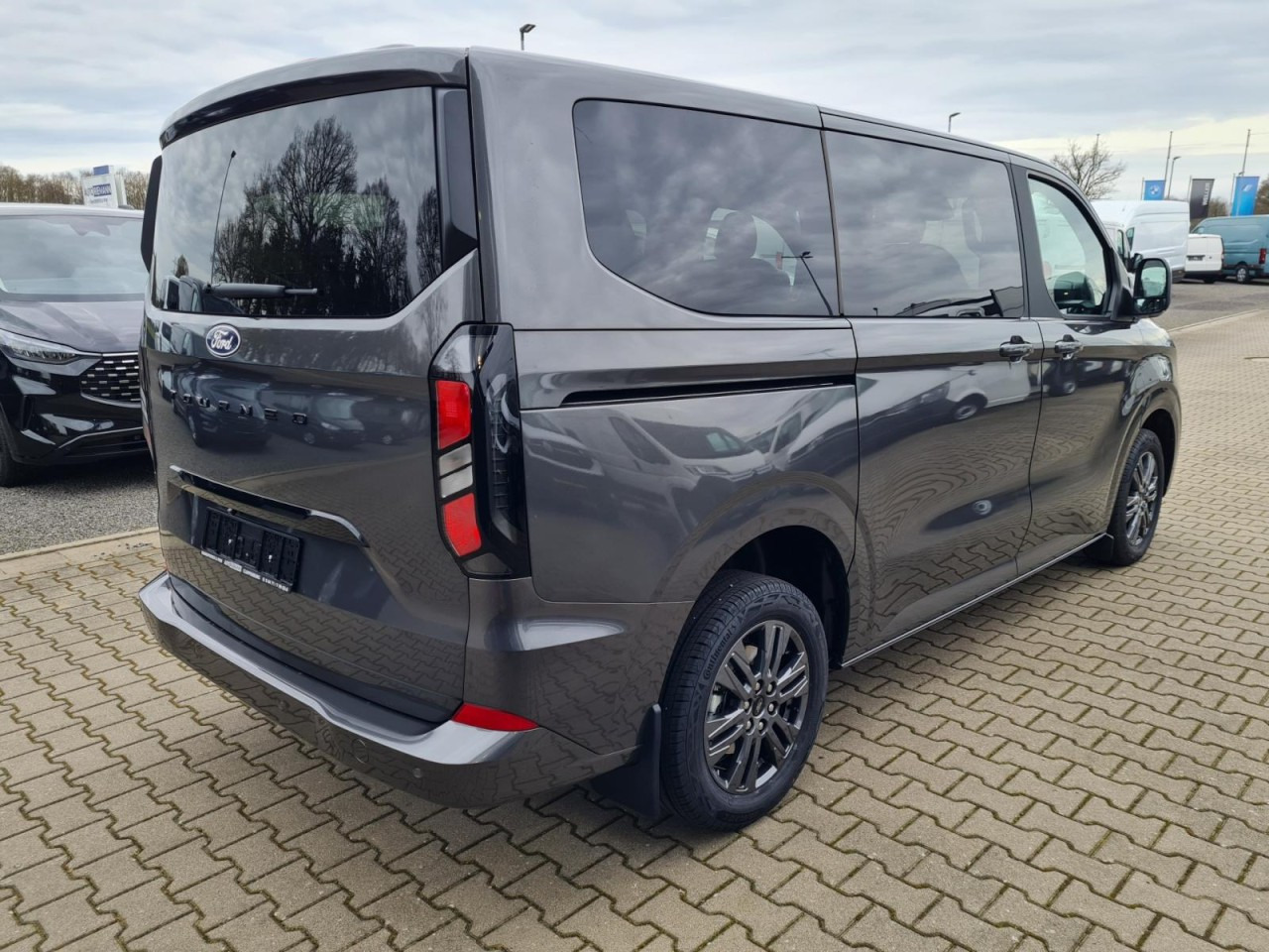 Ford Tourneo Custom 320 L1 AG Titanium X AHK LED NAVI 2X SCHIEBE - Mikrobus: zdjęcie 4 Ford Tourneo Custom 320 L1 AG Titanium X AHK LED NAVI 2X SCHIEBE - Mikrobus: zdjęcie 4