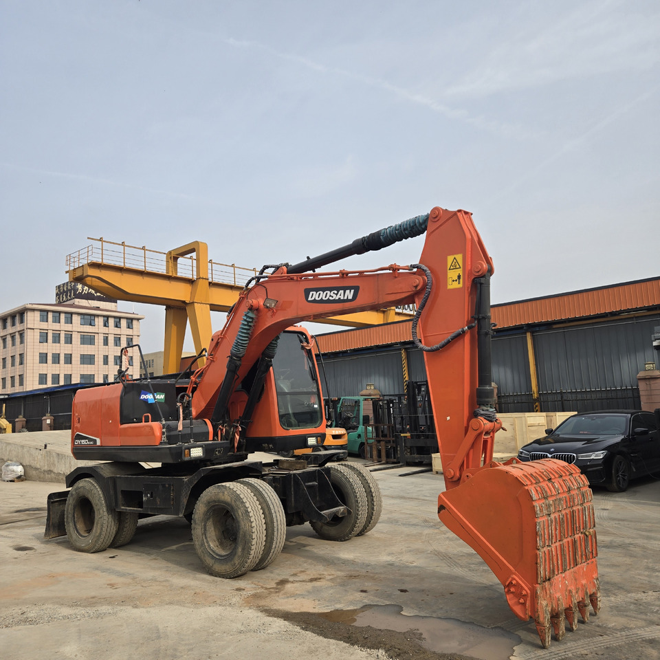 DOOSAN DX150W - Koparka kołowa: zdjęcie 1 DOOSAN DX150W - Koparka kołowa: zdjęcie 1
