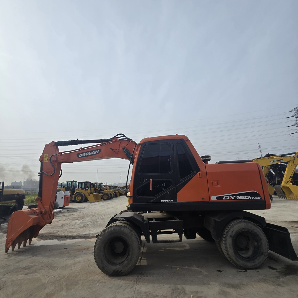 DOOSAN DX150W - Koparka kołowa: zdjęcie 2 DOOSAN DX150W - Koparka kołowa: zdjęcie 2