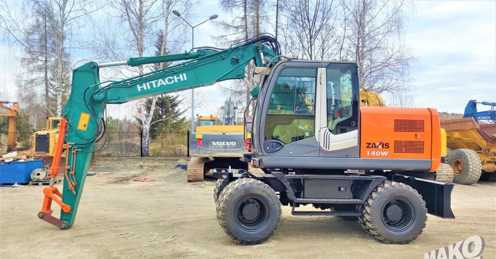 Hitachi ZX140W-3 - Koparka kołowa: zdjęcie 1 Hitachi ZX140W-3 - Koparka kołowa: zdjęcie 1