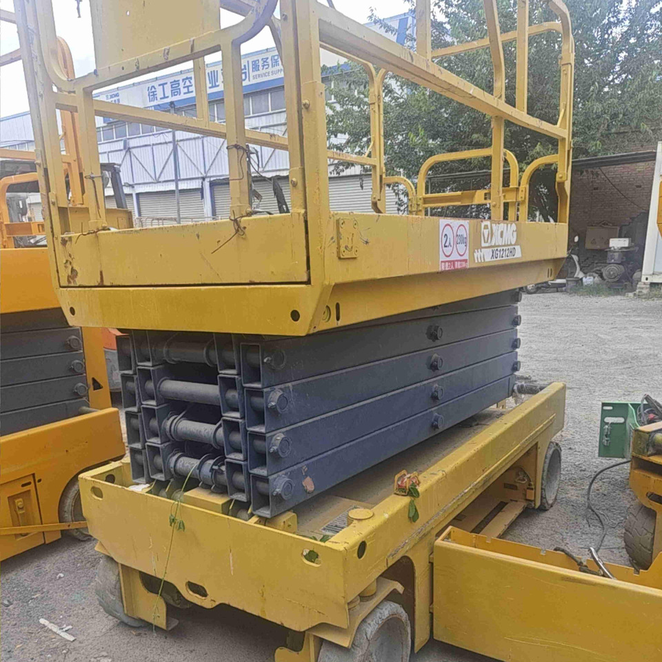 XCMG XG1212HD mobile drive 12m second hand scissor lift platform price - Maszyna budowlana: zdjęcie 5 XCMG XG1212HD mobile drive 12m second hand scissor lift platform price - Maszyna budowlana: zdjęcie 5