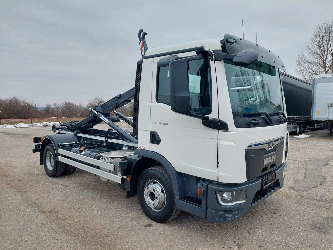 MAN TG3 TGL 12.190 BB 4x2 - Ciężarówka hakowiec: zdjęcie 2 MAN TG3 TGL 12.190 BB 4x2 - Ciężarówka hakowiec: zdjęcie 2