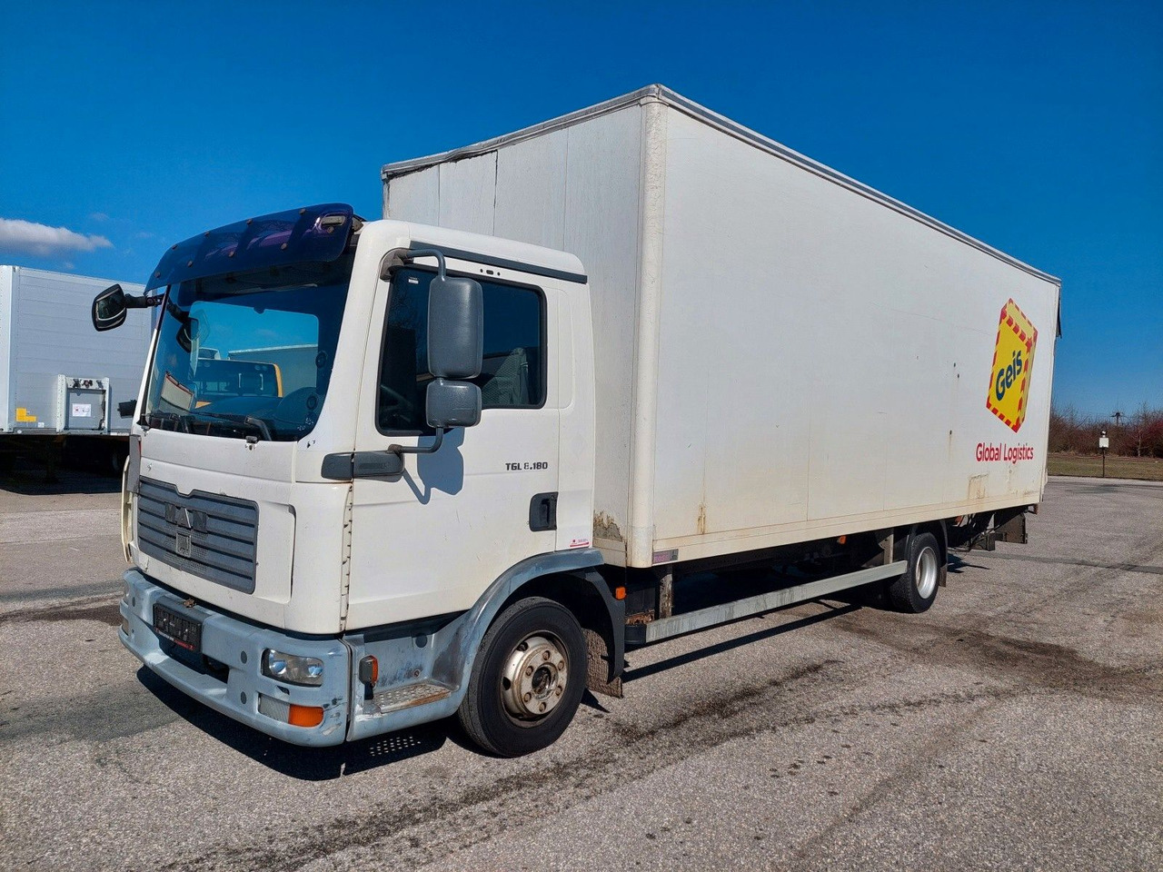 MAN TGL 7.180 4X2 BL - Dostawczy kontener: zdjęcie 1 MAN TGL 7.180 4X2 BL - Dostawczy kontener: zdjęcie 1