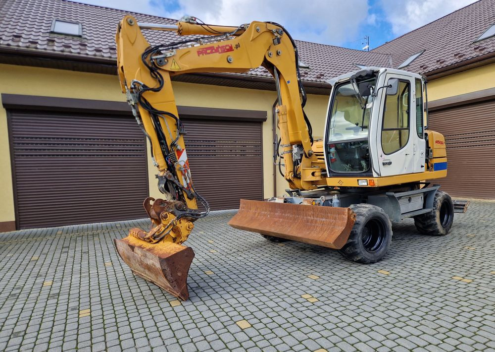 Koparka kołowa Liebherr A311 2008 Liebherr - Koparka kołowa: zdjęcie 1 Koparka kołowa Liebherr A311 2008 Liebherr - Koparka kołowa: zdjęcie 1