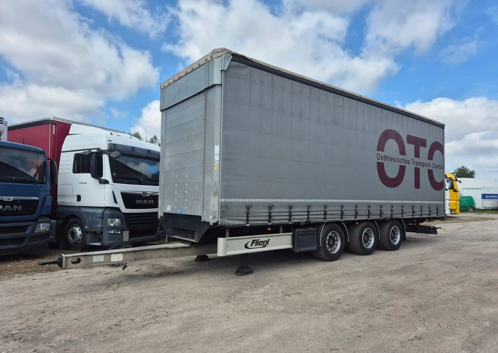 Fliegl Tandem 3 osie - Przyczepa z plandeką: zdjęcie 1 Fliegl Tandem 3 osie - Przyczepa z plandeką: zdjęcie 1