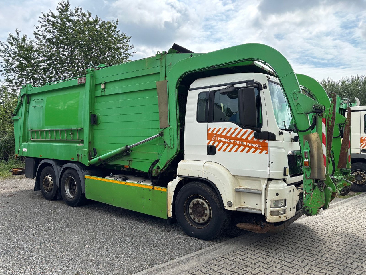 MAN TGS 26.320 EEV Heil Aufbau/Frontlader/Lift - Śmieciarka: zdjęcie 3 MAN TGS 26.320 EEV Heil Aufbau/Frontlader/Lift - Śmieciarka: zdjęcie 3