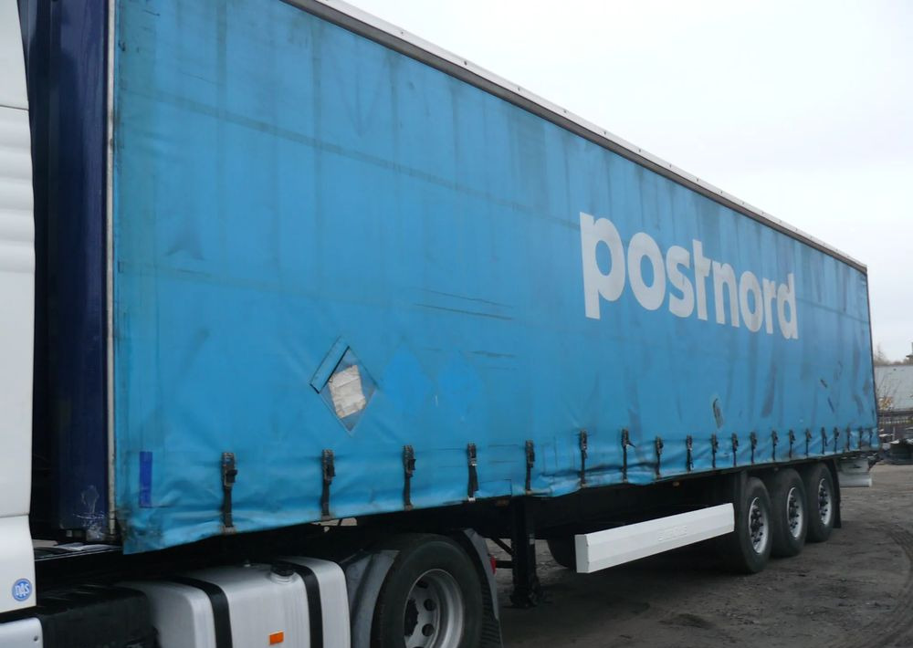 Krone SDP27 - Samochód ciężarowy plandeka: zdjęcie 1 Krone SDP27 - Samochód ciężarowy plandeka: zdjęcie 1