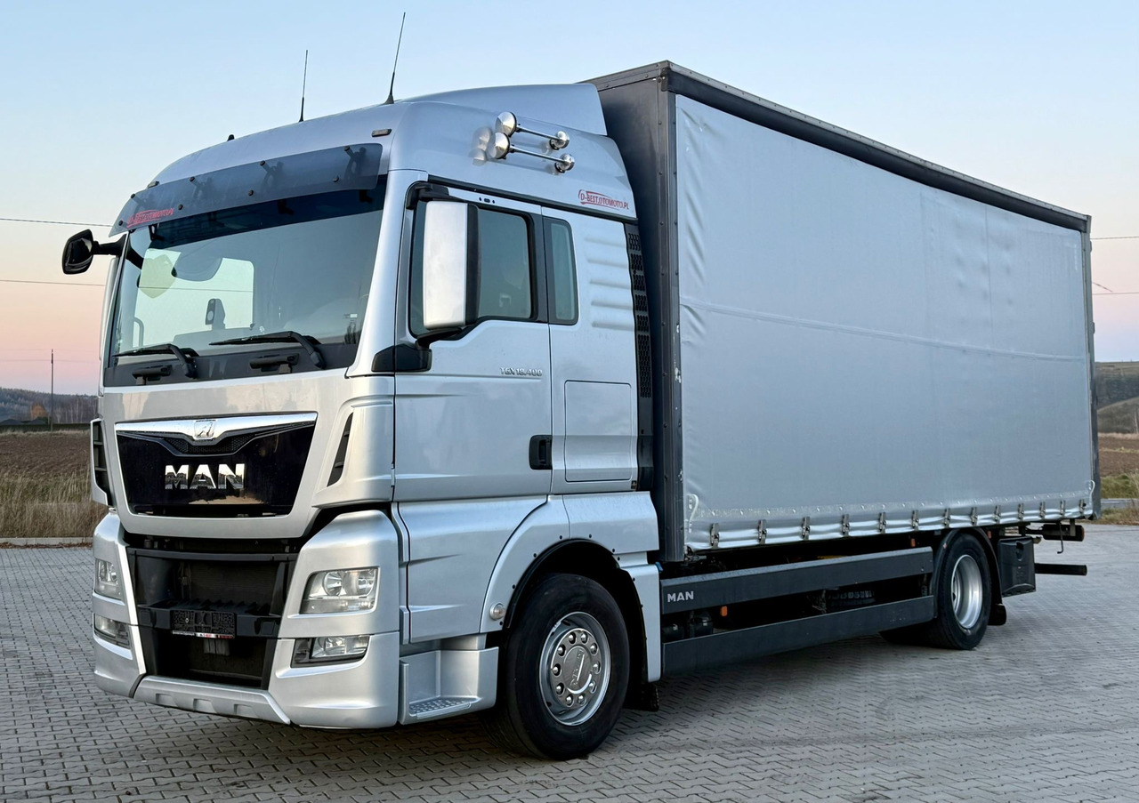 MAN TGX 18.400 / FIRANKA / KONTENER / NISKI PRZEBIEG / EURO 6 / AUTOMAT / SYPIALKA / 2016 ROK - Samochód ciężarowy plandeka: zdjęcie 2 MAN TGX 18.400 / FIRANKA / KONTENER / NISKI PRZEBIEG / EURO 6 / AUTOMAT / SYPIALKA / 2016 ROK - Samochód ciężarowy plandeka: zdjęcie 2