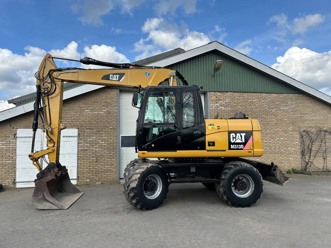 Caterpillar M313D - Koparka kołowa: zdjęcie 1 Caterpillar M313D - Koparka kołowa: zdjęcie 1