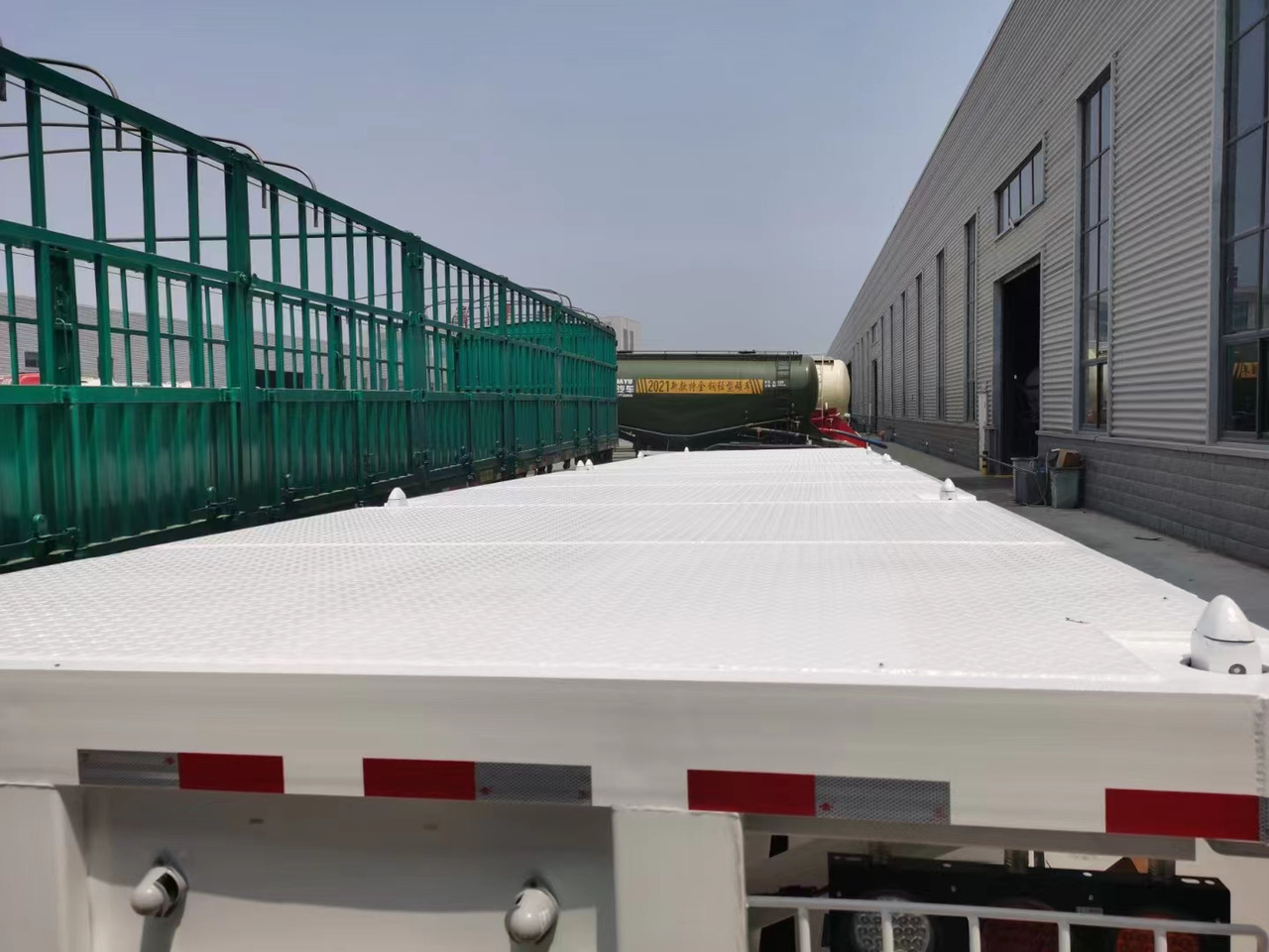 JSIE JSIE9400PBB - Naczepa kontenerowiec/ System wymienny: zdjęcie 1 JSIE JSIE9400PBB - Naczepa kontenerowiec/ System wymienny: zdjęcie 1