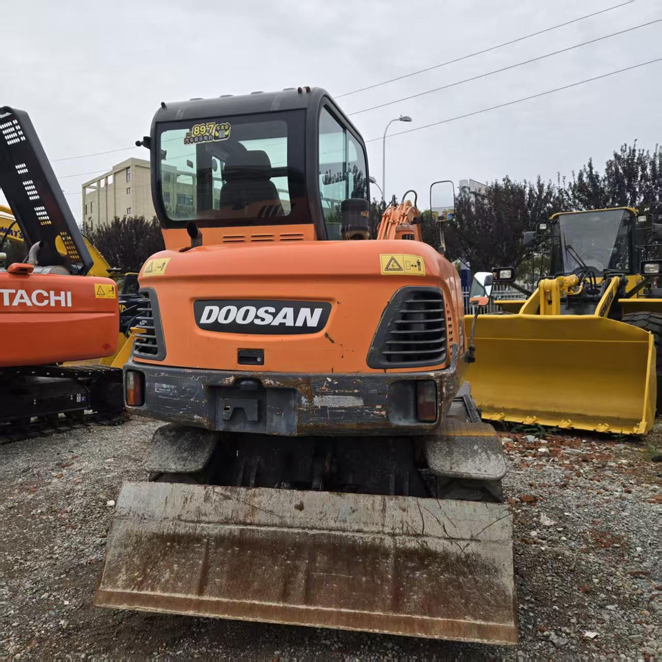 DOOSAN DX60W - Koparka kołowa: zdjęcie 4 DOOSAN DX60W - Koparka kołowa: zdjęcie 4