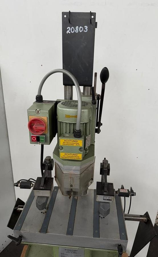 Türbänder-Bohrautomat SCHÜCO - Wiertarka stołowa: zdjęcie 2 Türbänder-Bohrautomat SCHÜCO - Wiertarka stołowa: zdjęcie 2