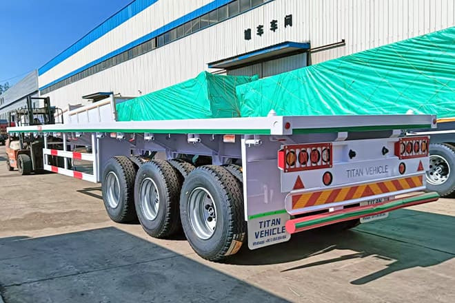 TITAN 3 Axle 40 Ft Flatbed Trailer for Sale in Mauritania - Naczepa kontenerowiec/ System wymienny: zdjęcie 1 TITAN 3 Axle 40 Ft Flatbed Trailer for Sale in Mauritania - Naczepa kontenerowiec/ System wymienny: zdjęcie 1