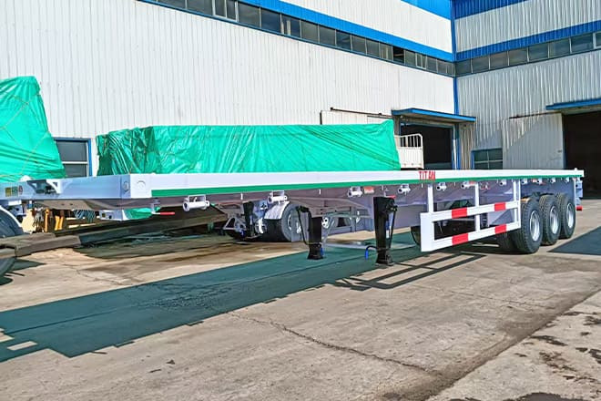 TITAN 3 Axle 40 Ft Flatbed Trailer for Sale in Mauritania - Naczepa kontenerowiec/ System wymienny: zdjęcie 3 TITAN 3 Axle 40 Ft Flatbed Trailer for Sale in Mauritania - Naczepa kontenerowiec/ System wymienny: zdjęcie 3