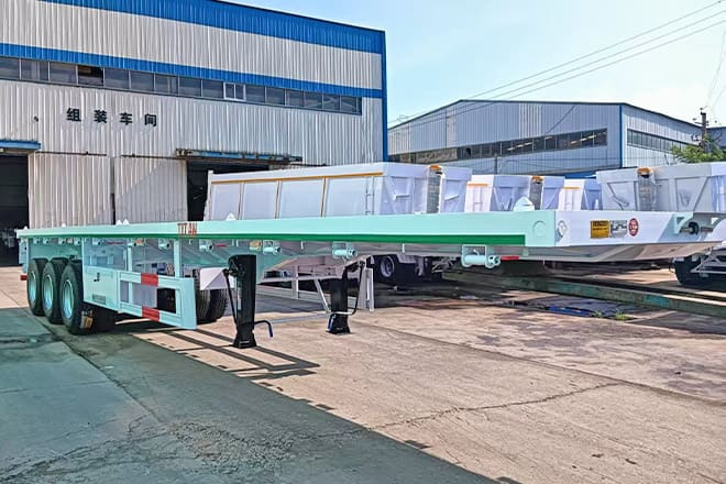 TITAN 3 Axle 40 Ft Flatbed Trailer for Sale in Mauritania - Naczepa kontenerowiec/ System wymienny: zdjęcie 4 TITAN 3 Axle 40 Ft Flatbed Trailer for Sale in Mauritania - Naczepa kontenerowiec/ System wymienny: zdjęcie 4