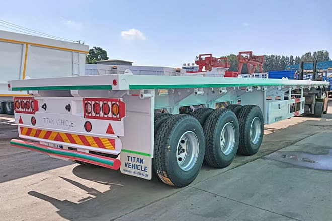 TITAN 3 Axle 40 Ft Flatbed Trailer for Sale in Mauritania - Naczepa kontenerowiec/ System wymienny: zdjęcie 2 TITAN 3 Axle 40 Ft Flatbed Trailer for Sale in Mauritania - Naczepa kontenerowiec/ System wymienny: zdjęcie 2