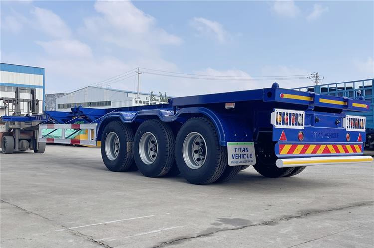 TITAN 40ft Container Chassis Trailer for Sale In Guam - Naczepa kontenerowiec/ System wymienny: zdjęcie 2 TITAN 40ft Container Chassis Trailer for Sale In Guam - Naczepa kontenerowiec/ System wymienny: zdjęcie 2