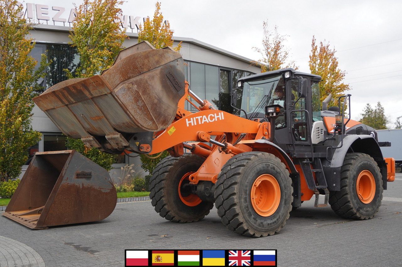 HITACHI ZW220 articulated loader / 2 buckets - Ładowarka kołowa: zdjęcie 1 HITACHI ZW220 articulated loader / 2 buckets - Ładowarka kołowa: zdjęcie 1