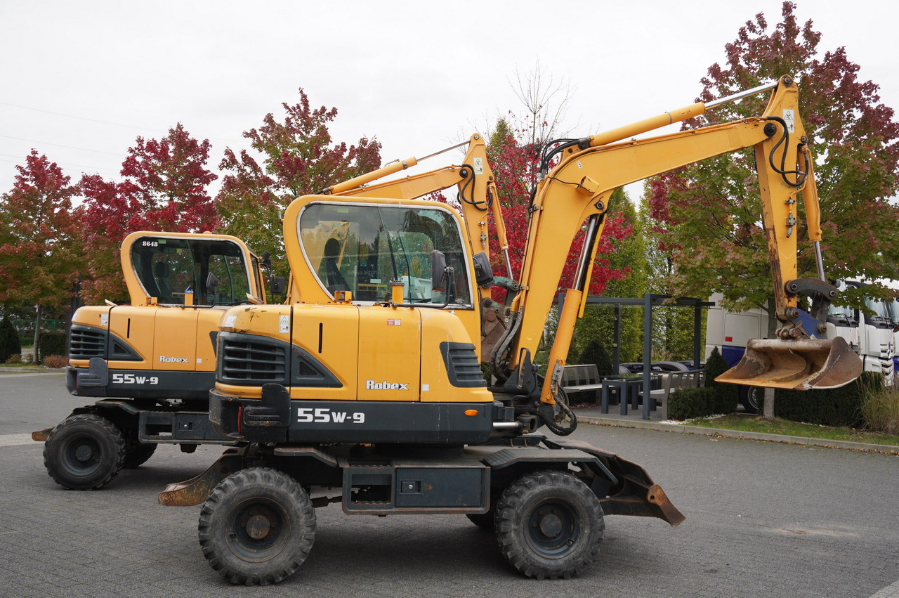 Hyundai Robex 55W-9 Wheeled Excavator 5.5t / 2pcs - Minikoparka: zdjęcie 4 Hyundai Robex 55W-9 Wheeled Excavator 5.5t / 2pcs - Minikoparka: zdjęcie 4