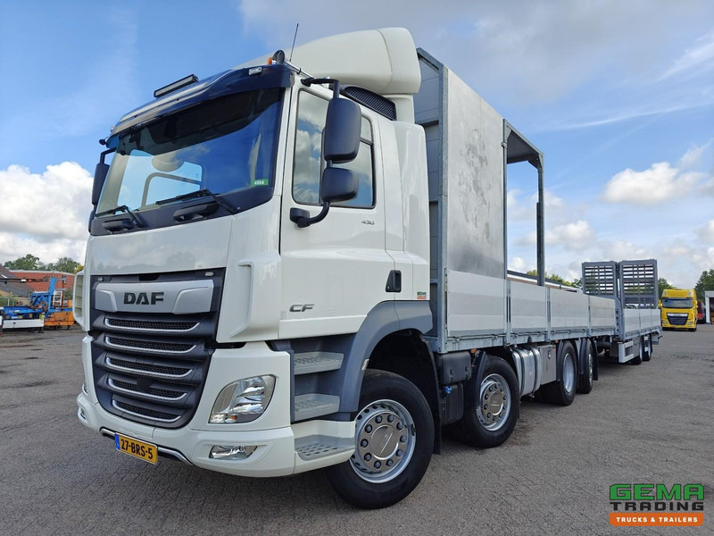DAF CF 430 FAX 8x2/6 Dagcabine Euro6D - Machine Transporter + 2assige Aanhanger - Hydraulische Rampen - Afneembare 10.000L WaterTank - 20.000km! Origineel - Ciężarówka do przewozu samochodów: zdjęcie 1 DAF CF 430 FAX 8x2/6 Dagcabine Euro6D - Machine Transporter + 2assige Aanhanger - Hydraulische Rampen - Afneembare 10.000L WaterTank - 20.000km! Origineel - Ciężarówka do przewozu samochodów: zdjęcie 1