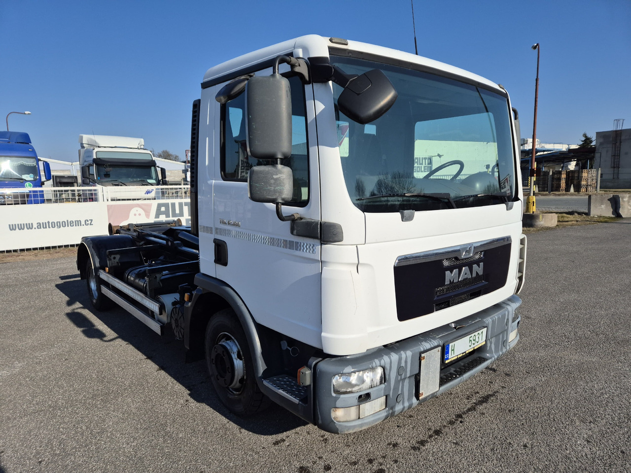 MAN TGL 12.180 - Ciężarówka hakowiec: zdjęcie 2 MAN TGL 12.180 - Ciężarówka hakowiec: zdjęcie 2
