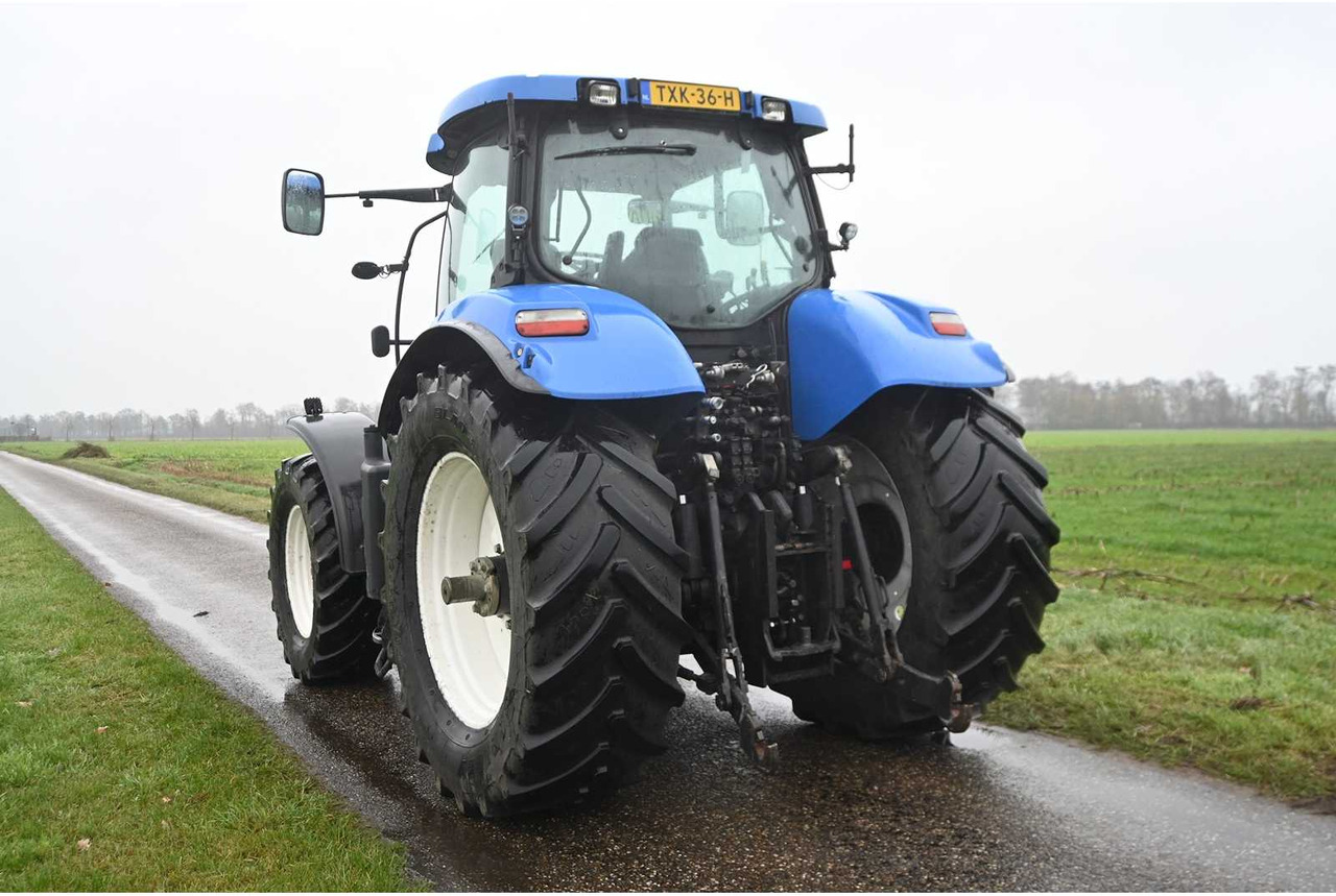 NEW HOLLAND - 2007 - T7030 - ALL-WHEEL DRIVE FARM TRACTOR - Ciągnik rolniczy: zdjęcie 5 NEW HOLLAND - 2007 - T7030 - ALL-WHEEL DRIVE FARM TRACTOR - Ciągnik rolniczy: zdjęcie 5