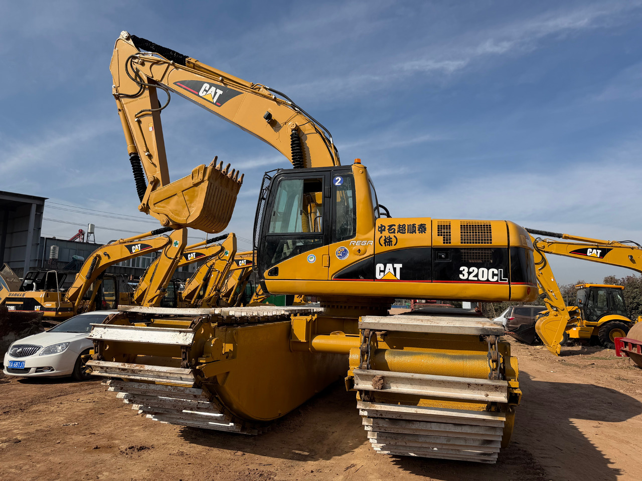 CAT 320CL - Pływająca koparka: zdjęcie 2 CAT 320CL - Pływająca koparka: zdjęcie 2